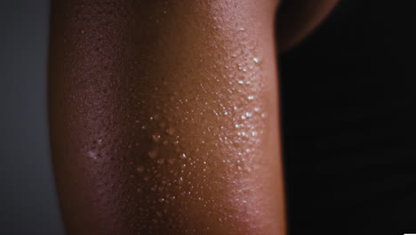 Close-Up-Shot-Of-Beads-Of-Sweat-On-Woman-Wearing-Gym-Fitness-Clothing-Exercising-4